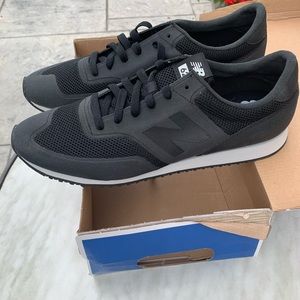 Men’s new balance black sneakers in size 11